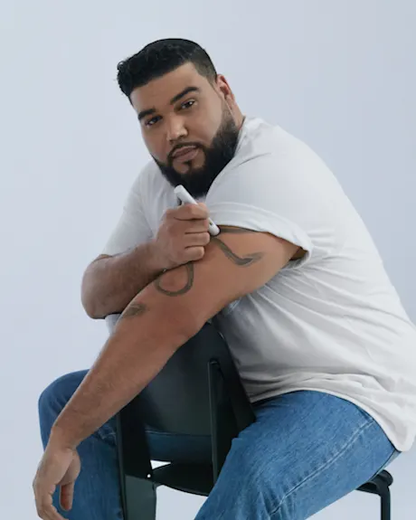 man using ozempic to aid weight loss