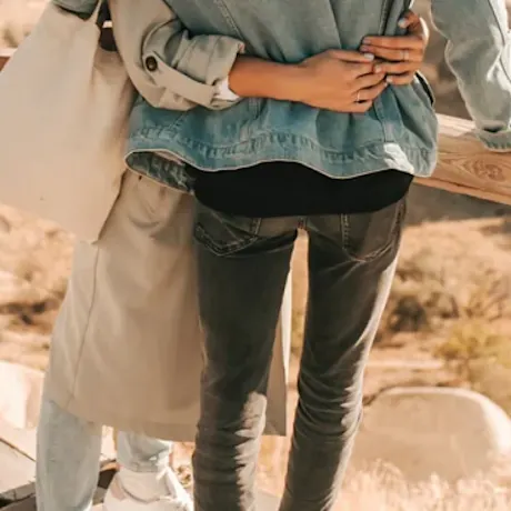 a couple hugging each other