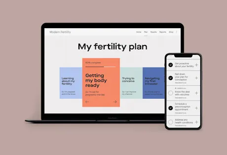 Modern Fertility tracker on laptop and cellphone